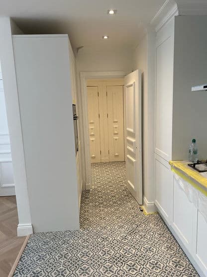 Finished loft bedroom conversion with fitted storage in London